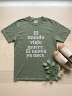 El Mundo Viejo Muere El Nuevo Ya Nace Spanish Spiritual T-Shirt Latino Heritage Awakening Tee